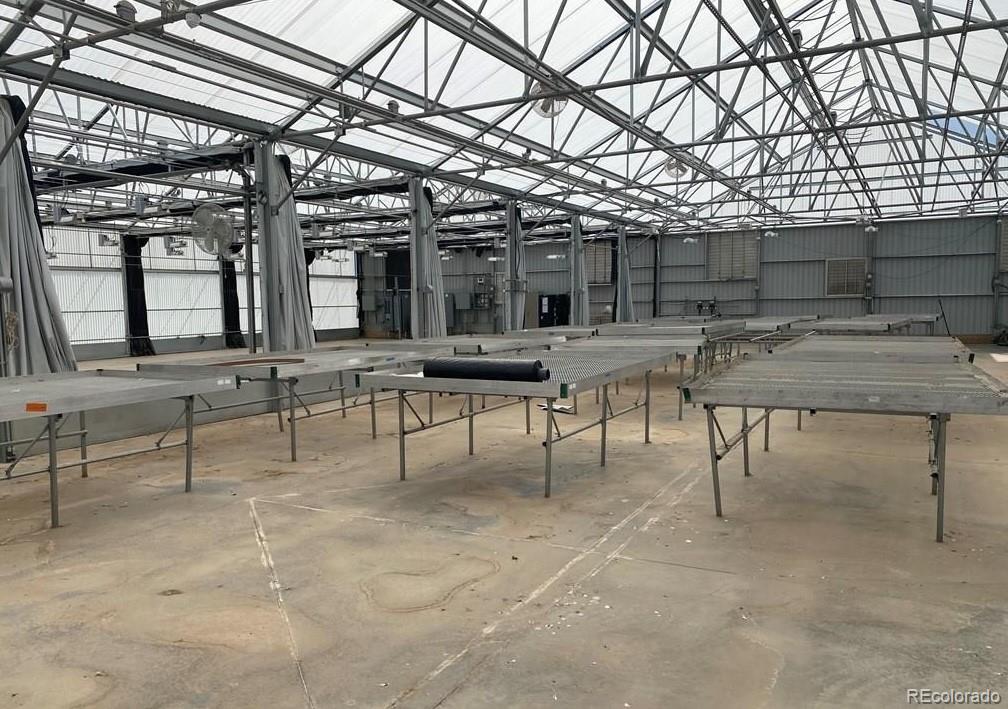 8648 Lake Davis Road Pueblo, CO 81005 - Photo 25 of 50 a view of a patio with table and chairs