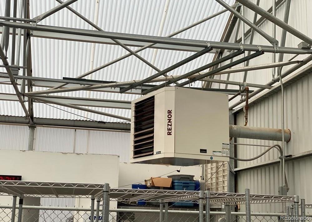 8648 Lake Davis Road Pueblo, CO 81005 - Photo 50 of 50 a view of a kitchen with furniture and wooden floor