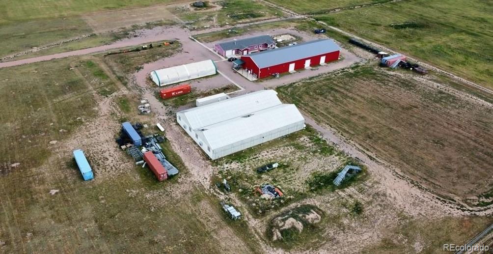 8648 Lake Davis Road Pueblo, CO 81005 - Photo 10 of 50 an aerial view of a house with a yard