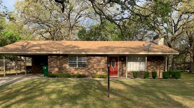 3104 South Lipsey Street Decatur, TX 76234 - Photo 1 of 18 a backyard of a house with barbeque oven table and chairs
