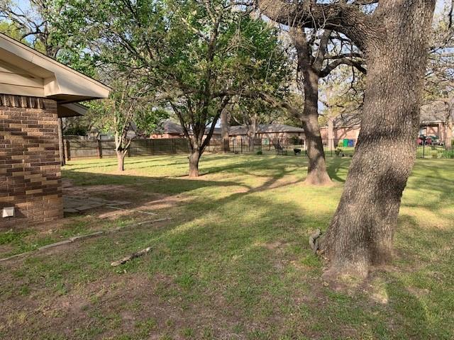 3104 South Lipsey Street Decatur, TX 76234 - Photo 3 of 18 a view of a playground with basketball court