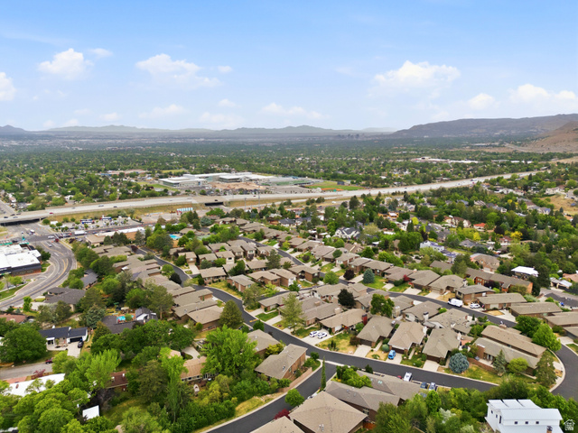3674 Oak Rim Way Salt Lake City, UT 84109 - Photo 45 of 47 Residential neighborhood with mature trees, established streets, and distant mountain ranges