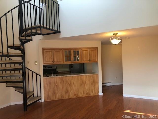 Welcome home to this spacious and updated 2 bedroom & 2 bathroom condo townhome! Love the spiral staircase to the MBR suite!