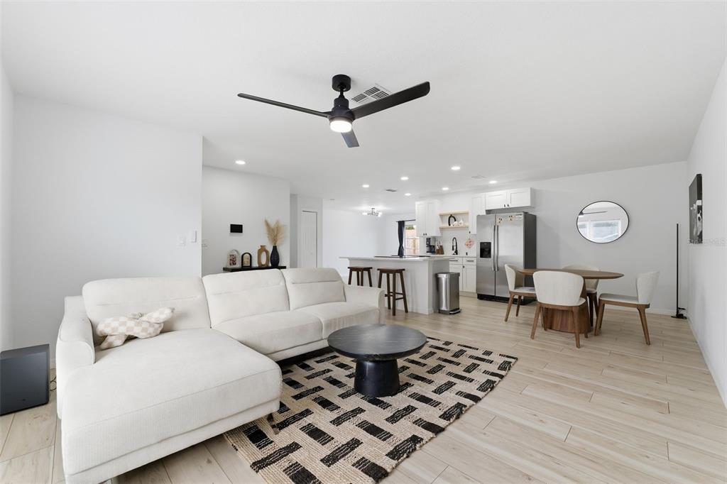 8025 San Fernando Drive Port Richey, FL 34668 - Photo 6 of 22 a living room with furniture and a wooden floor