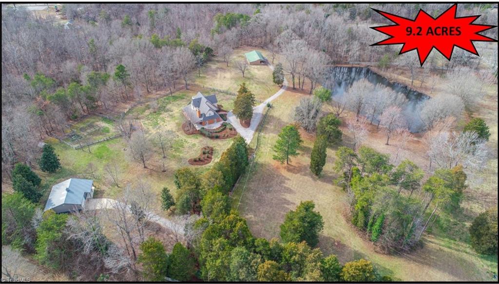 5606 Wallburg-High Point Road High Point, NC 27265 - Photo 1 of 30 As the saying goes...a picture paints a thousand words. This 9.2 acre estate is truly ONE-OF-A-KIND! Country living with city conveniences (MINUTES to Westchester Drive and Main Street restaurants and shopping)!!!