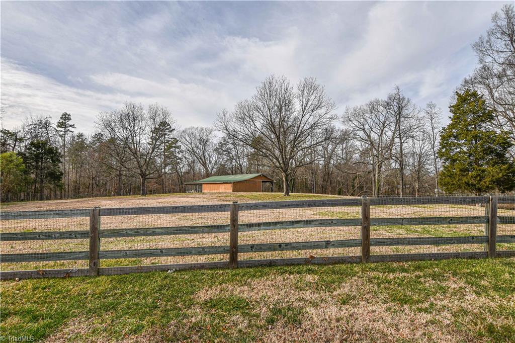 5606 Wallburg-High Point Road High Point, NC 27265 - Photo 28 of 30 CALLING ALL EQUINE ENTHUSIAST! This property includes a three stall barn + a well maintained pasture. *Note, new gates installed 2020!