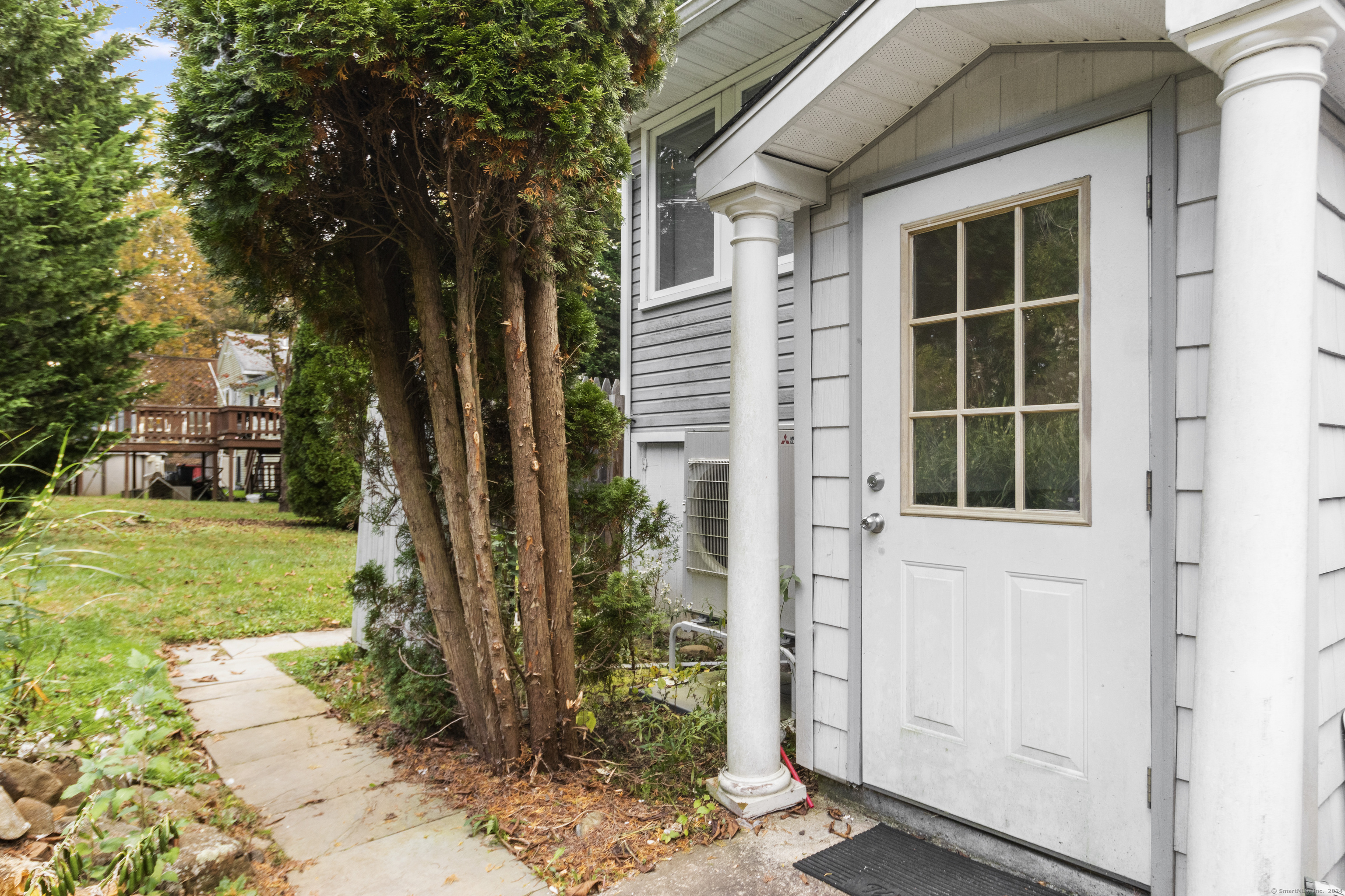 a view of a house with a garden