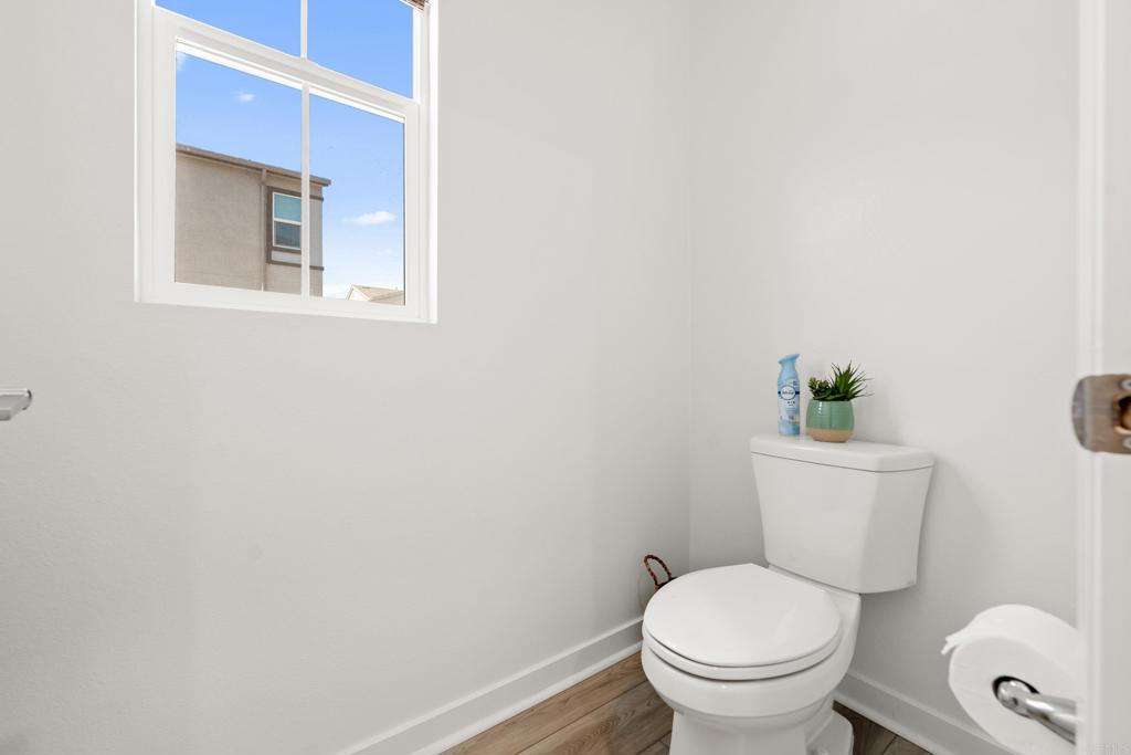 35115 Crop Place Fallbrook, CA 92028 - Photo 16 of 41 a white toilet sitting next to a bathroom sink