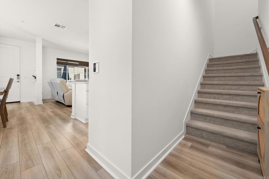 35115 Crop Place Fallbrook, CA 92028 - Photo 18 of 41 a view of entryway and hall with wooden floor
