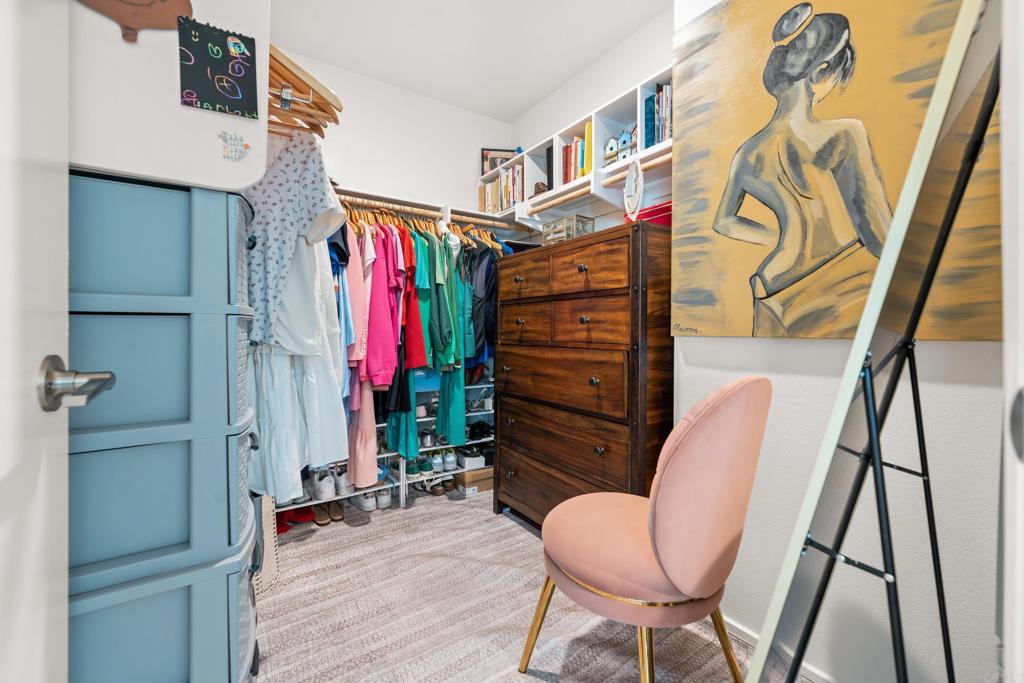35115 Crop Place Fallbrook, CA 92028 - Photo 21 of 41 a view of walk in closet with clothes and shoes