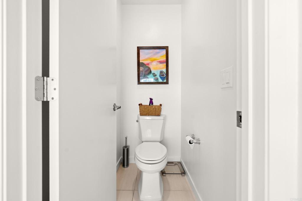 35115 Crop Place Fallbrook, CA 92028 - Photo 24 of 41 a white toilet sitting next to a small bathroom