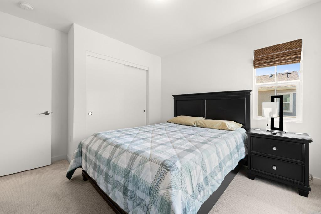 35115 Crop Place Fallbrook, CA 92028 - Photo 26 of 41 a bedroom with a bed and a dresser