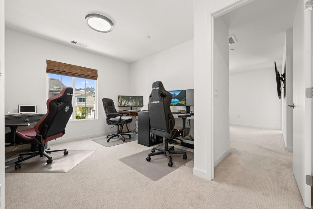 35115 Crop Place Fallbrook, CA 92028 - Photo 28 of 41 a view of a workspace with furniture and a window