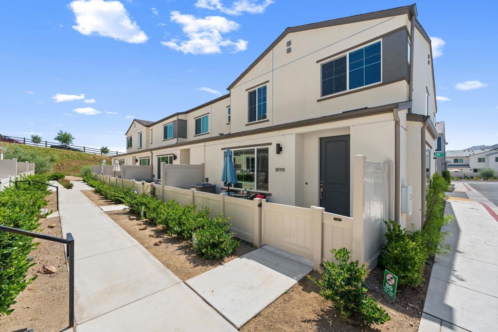 35115 Crop Place Fallbrook, CA 92028 - Photo 36 of 41 a front view of a house with a yard
