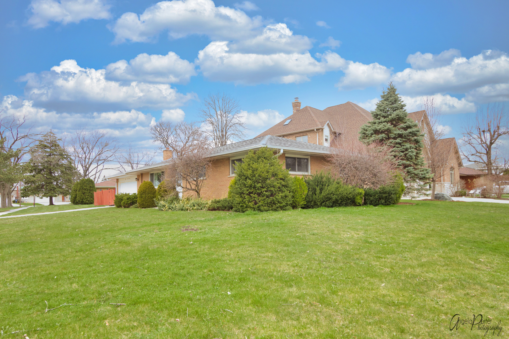 280 Westmere Road Des Plaines, IL 60016 - Photo 13 of 27 a view of a big house with a big yard and a large trees