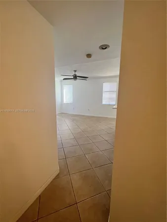 a view of a refrigerator in a bathroom
