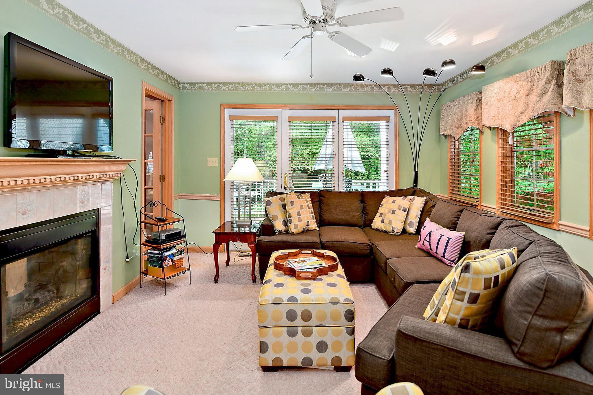 7 Abbyshire Road Ocean Pines, MD 21811 - Photo 14 of 29 Sunroom with Fireplace,slider to rear decking