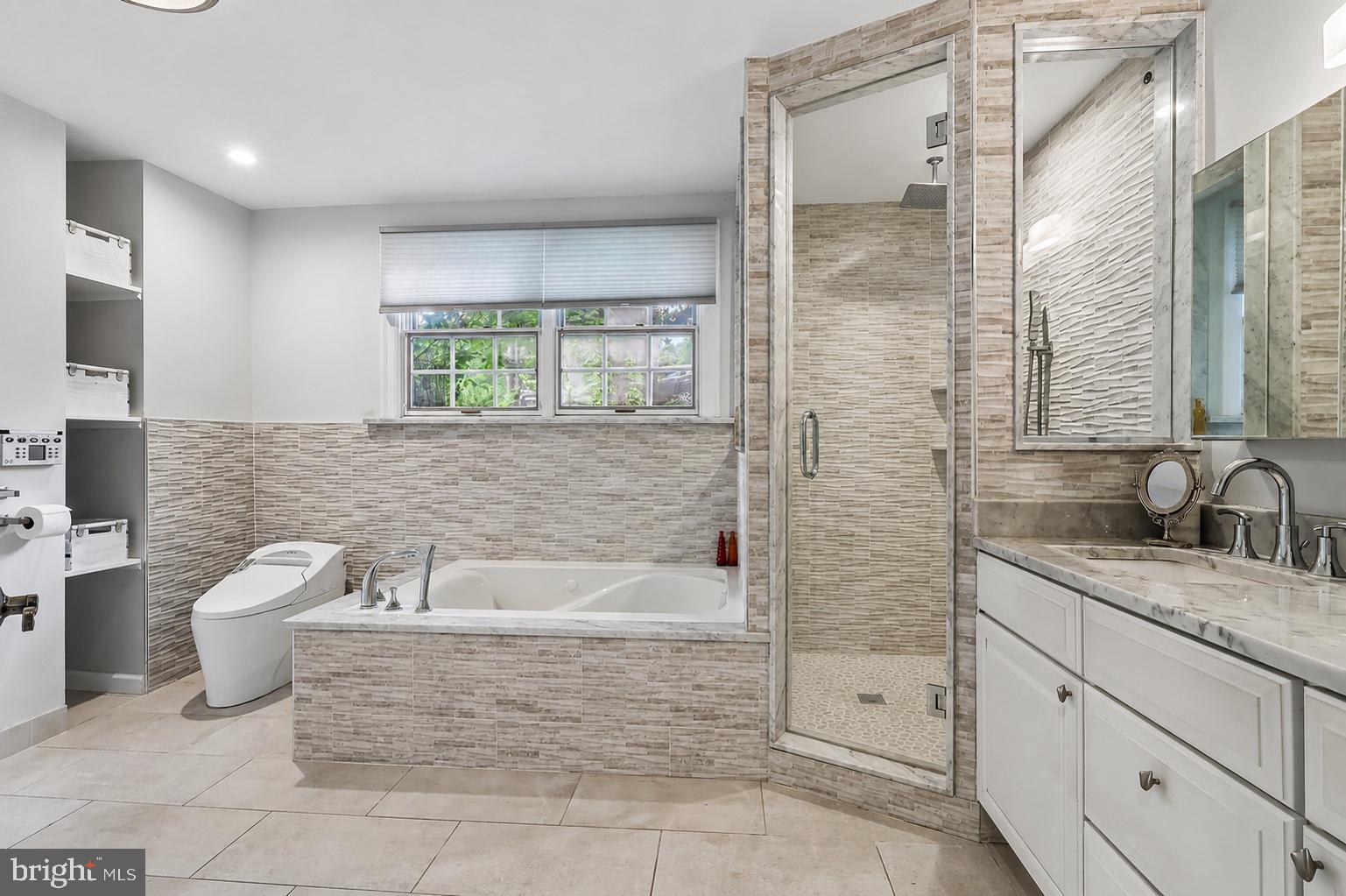 1223 Hagys Ford Road Penn Valley, PA 19072 - Photo 43 of 70 a bathroom with a granite countertop sink a toilet and bathtub