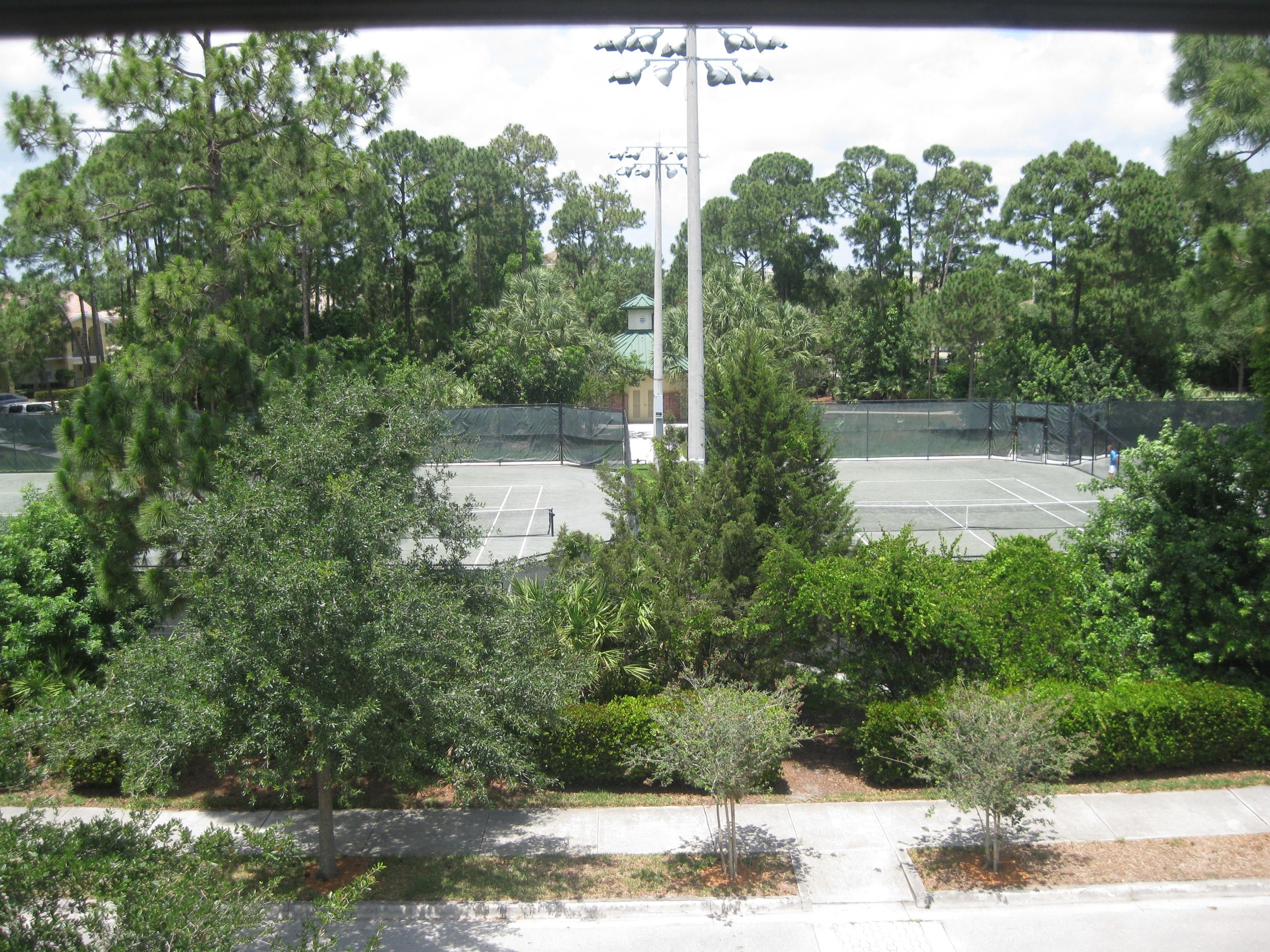 1570 Grande Cull Way Jupiter, FL 33458 - Photo 15 of 25 Tennis View from the Front
