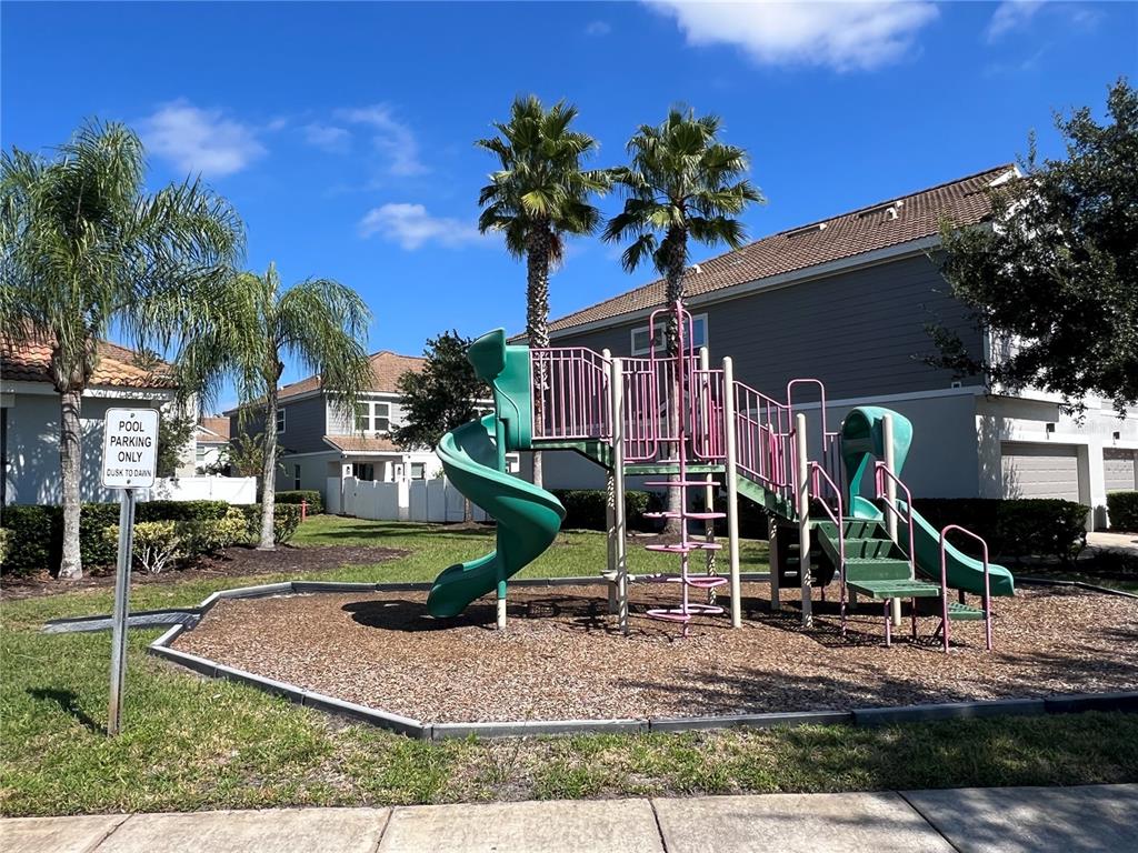 9013 Shepton Street Orlando, FL 32825 - Photo 18 of 20 a view of a park with slide