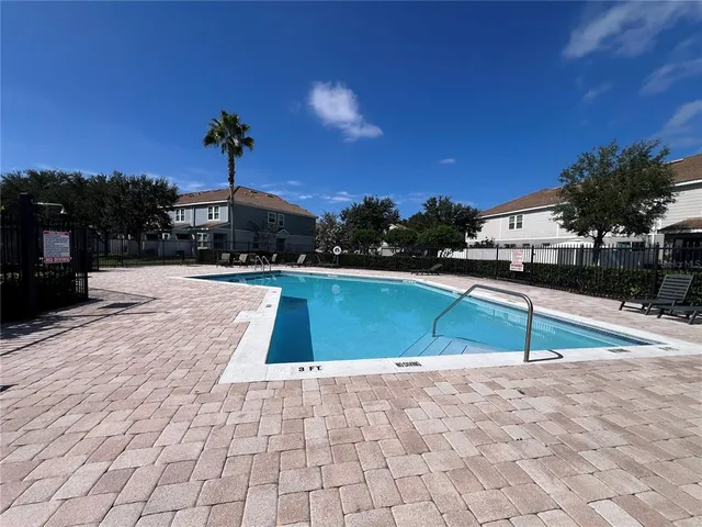 a view of outdoor space and swimming pool