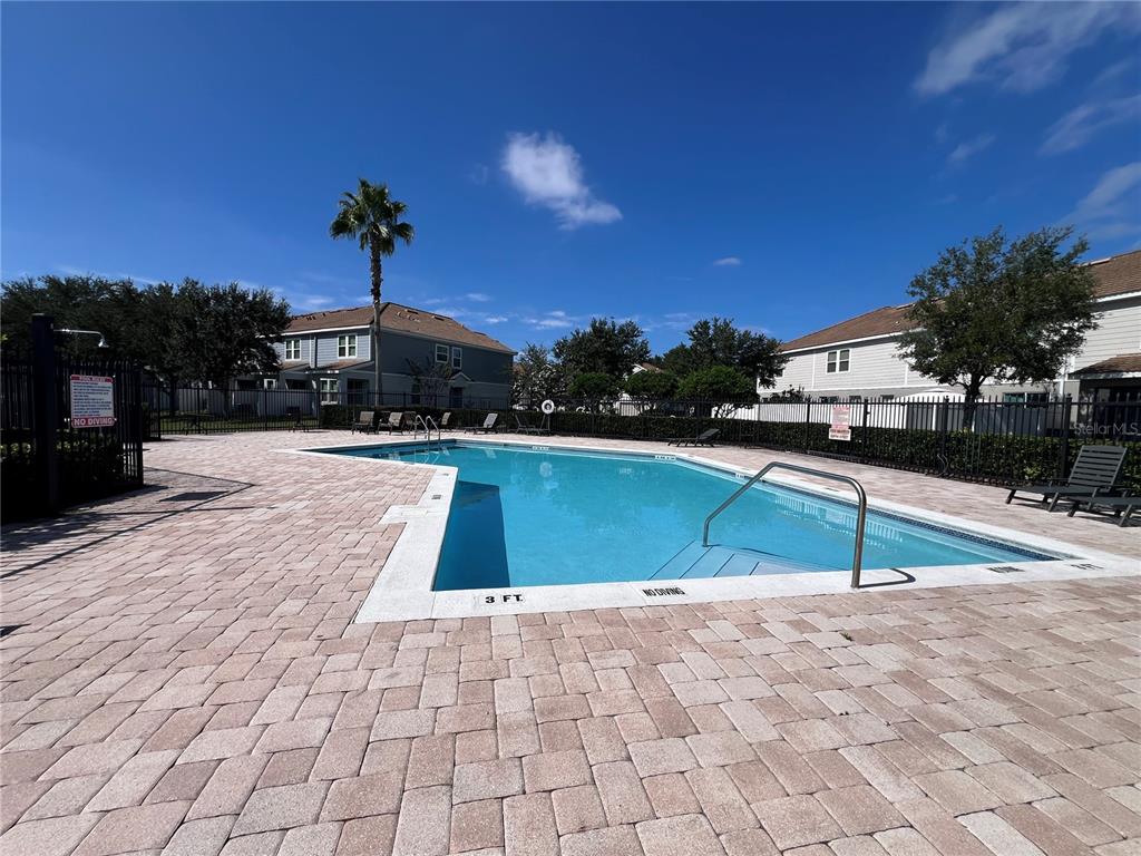 9013 Shepton Street Orlando, FL 32825 - Photo 20 of 20 a view of outdoor space and swimming pool