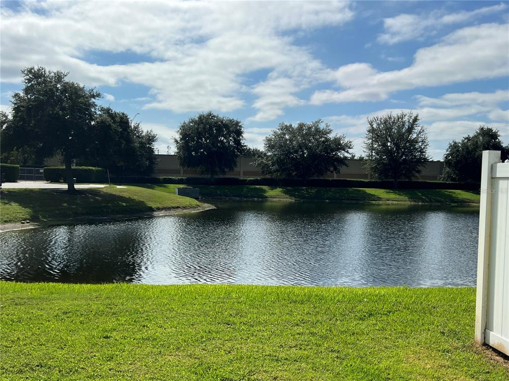 9013 Shepton Street Orlando, FL 32825 - Photo 6 of 20 a view of a lake