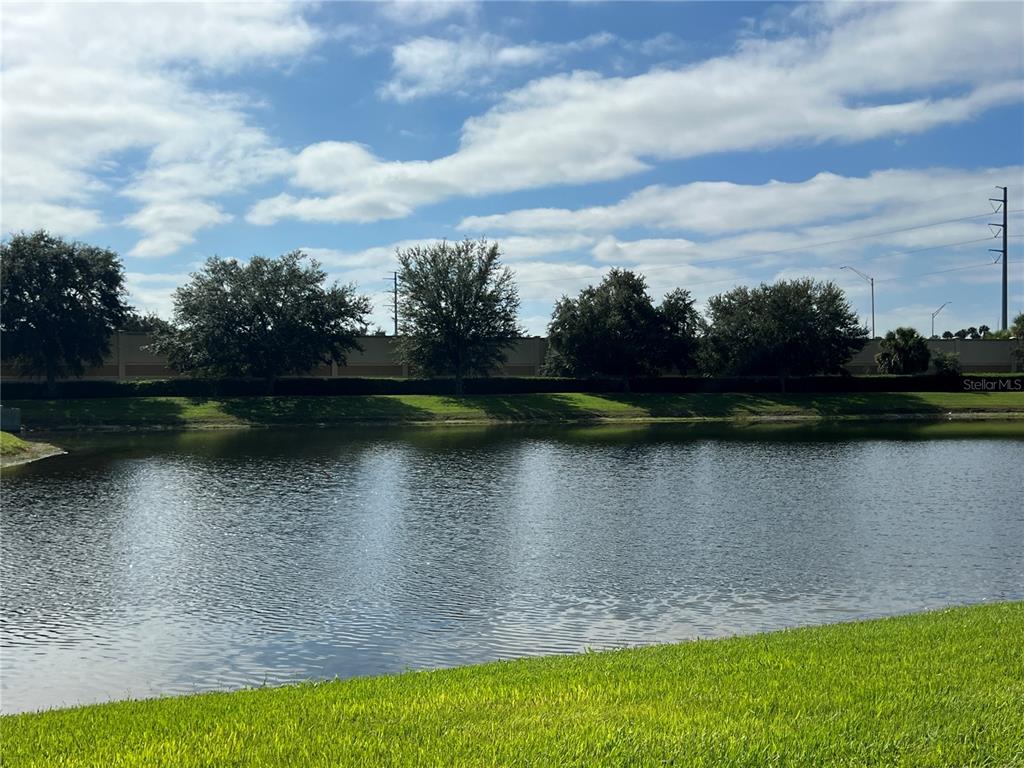 9013 Shepton Street Orlando, FL 32825 - Photo 7 of 20 a view of a lake