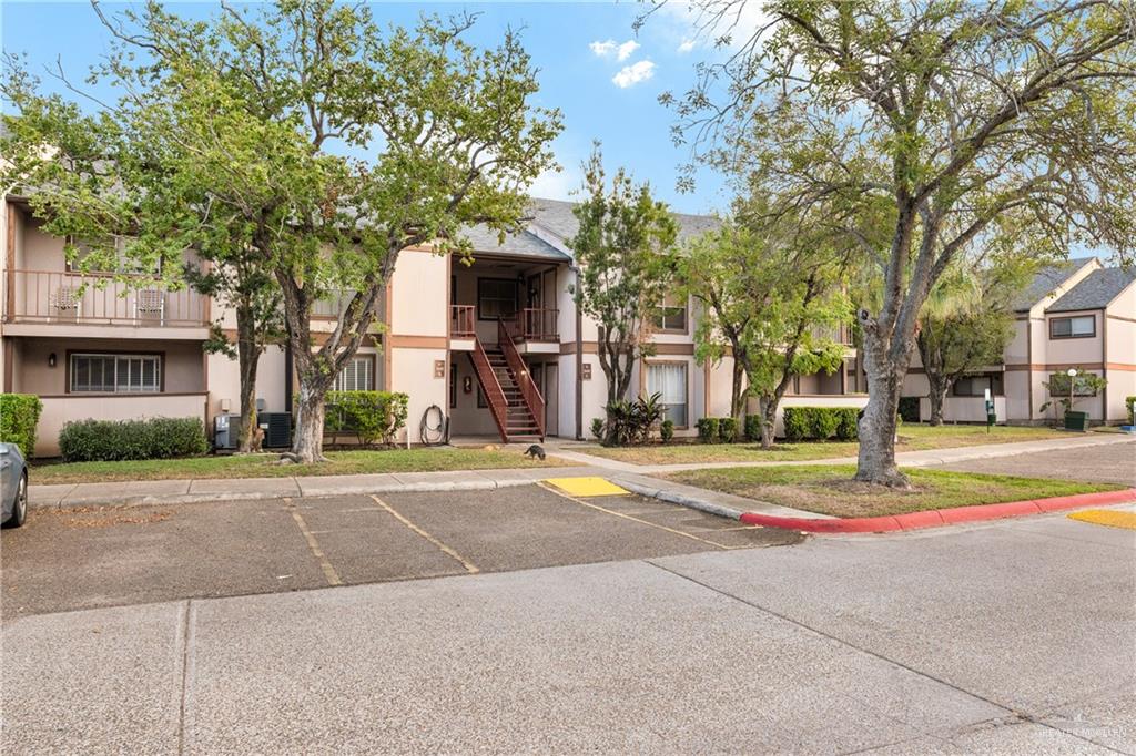3005 Old Alice Road, Unit 200G Brownsville, TX 78521 - Photo 13 of 21 a view of road with trees