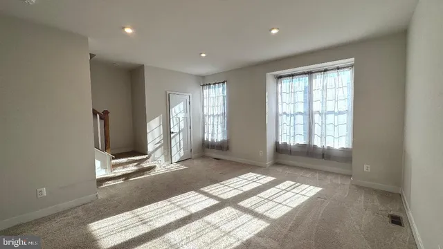 an empty room with windows