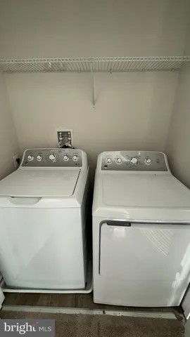 a view of balcony with wooden floor