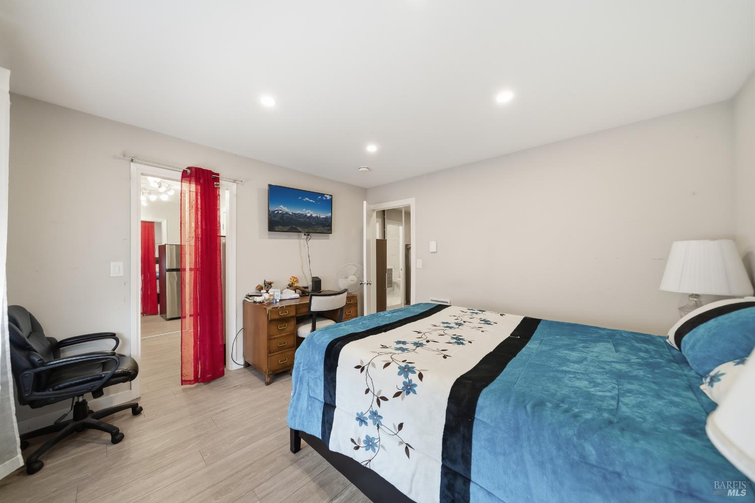 155 Canal Street, Unit 7 San Rafael, CA 94901 - Photo 9 of 17 a bedroom with a bed and a couch