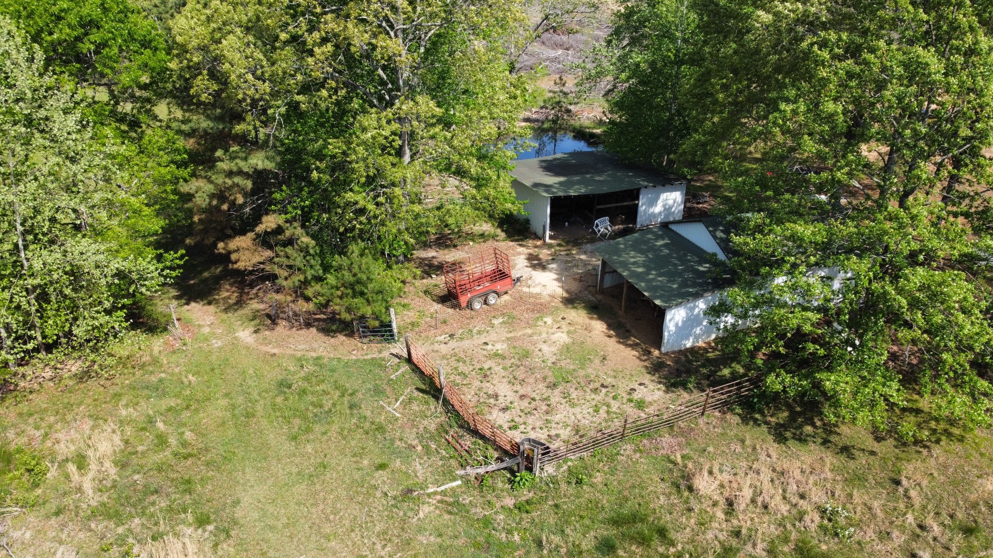 1185 Blackburn Road McKenzie, TN 38201 - Photo 17 of 33 a backyard of a house with table and chairs and potted plants