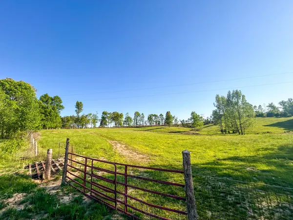 a view of a lake with a big yard