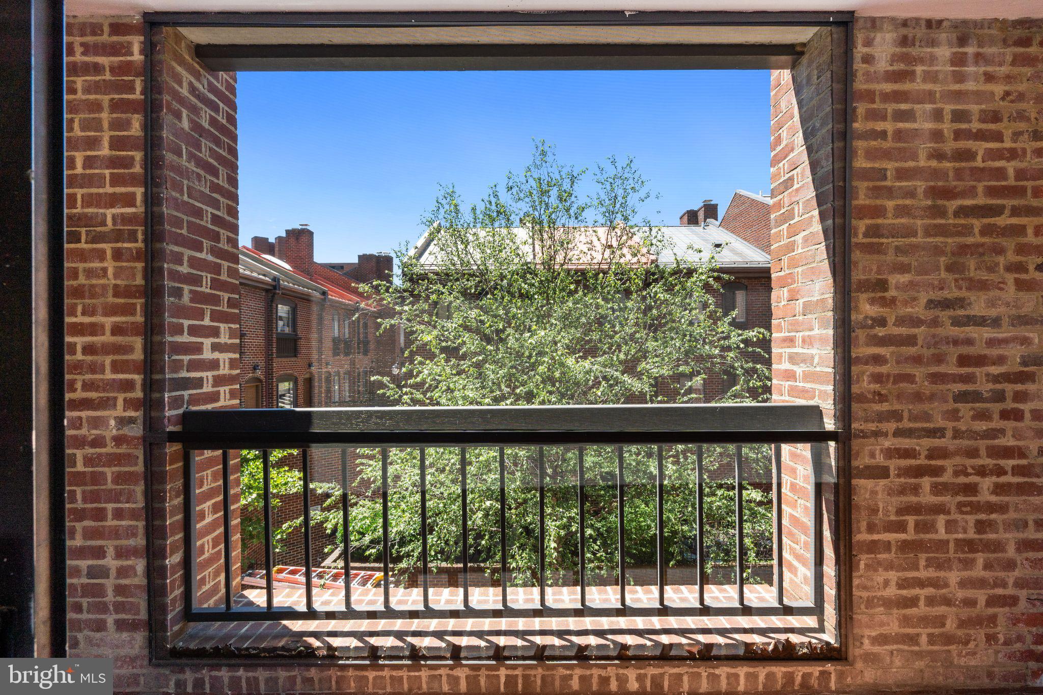 3225 Grace Street Northwest, Unit 226 Washington, DC 20007 - Photo 35 of 45 a view of a street from a balcony