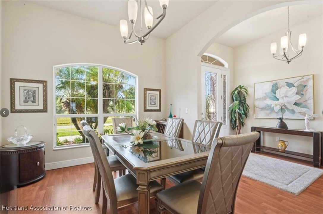 1101 Lakeside Way Sebring, FL 33876 - Photo 15 of 41 a view of a dining room with furniture window and outside view