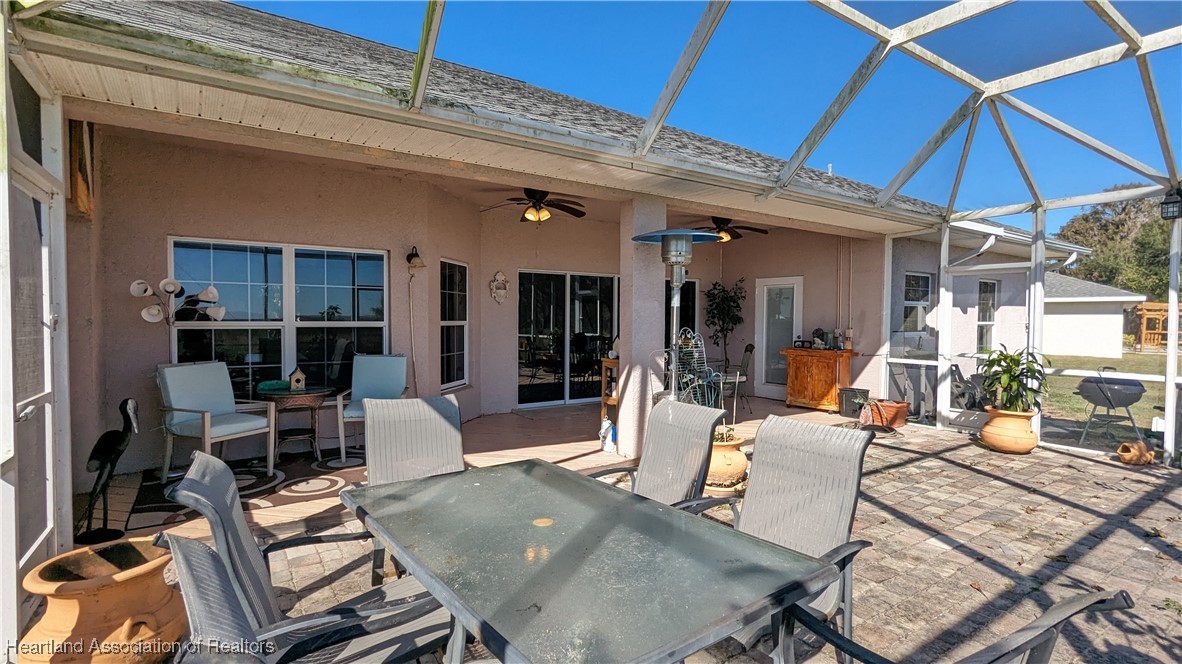 1101 Lakeside Way Sebring, FL 33876 - Photo 37 of 41 a view of a dining room with furniture window and outside view