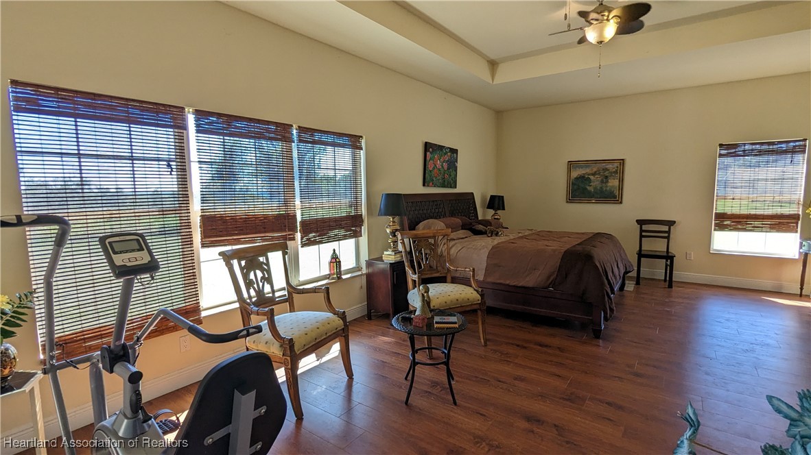 1101 Lakeside Way Sebring, FL 33876 - Photo 6 of 41 a bedroom with furniture and a window