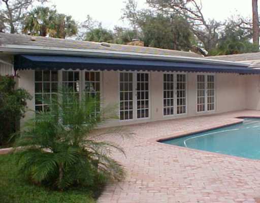 32 Southwest 14th Avenue Boca Raton, FL 33486 - Photo 2 of 11 a view of house with backyard and garden
