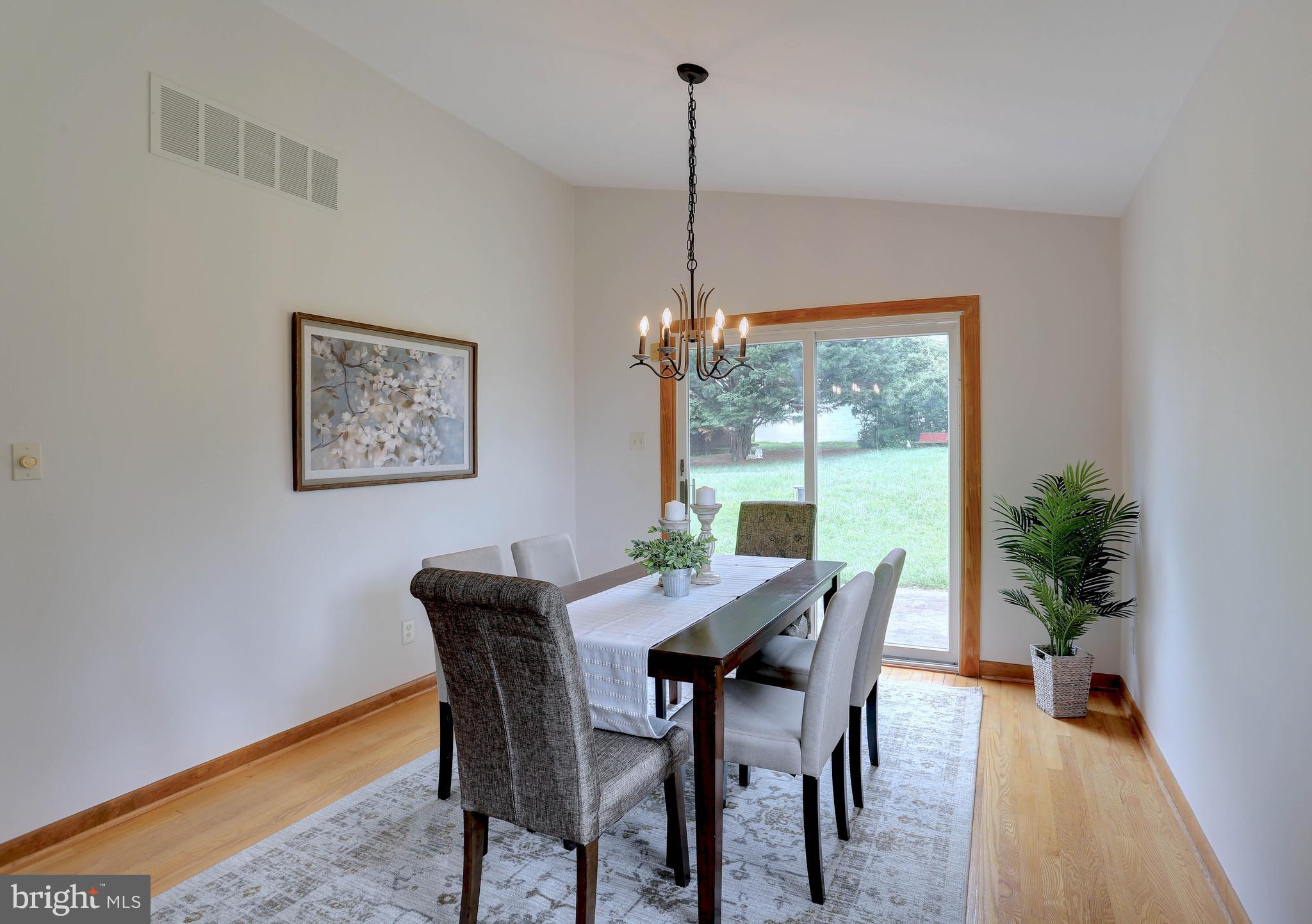 8453 Rolling Ridge Court Ellicott City, MD 21043 - Photo 9 of 39 Dining room with slider to rear patio