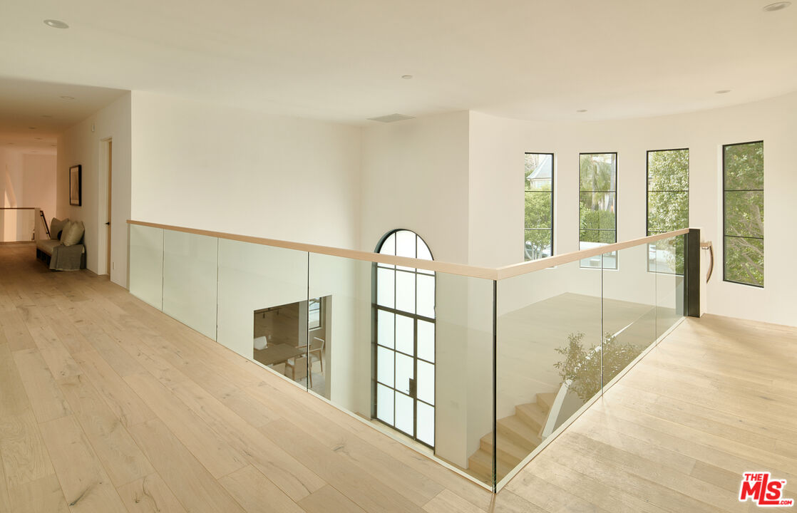 3858 Hayvenhurst Drive Encino, CA 91436 - Photo 25 of 49 a view of an entryway with staircase