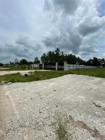 a view of a golf course with a lake