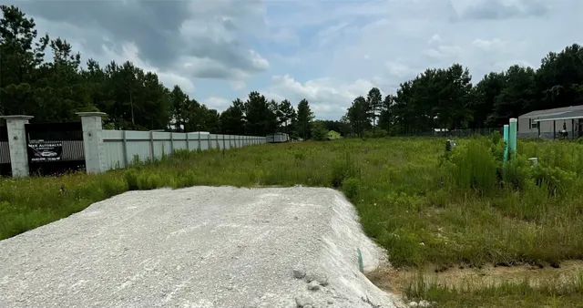 a view of a golf course with a garden