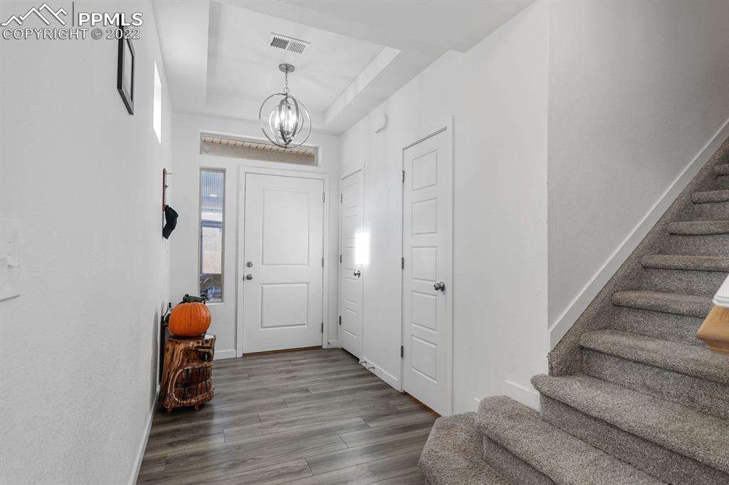 9319 Timberlake Loop Colorado Springs, CO 80927 - Photo 5 of 25 a view of hallway with wooden floor