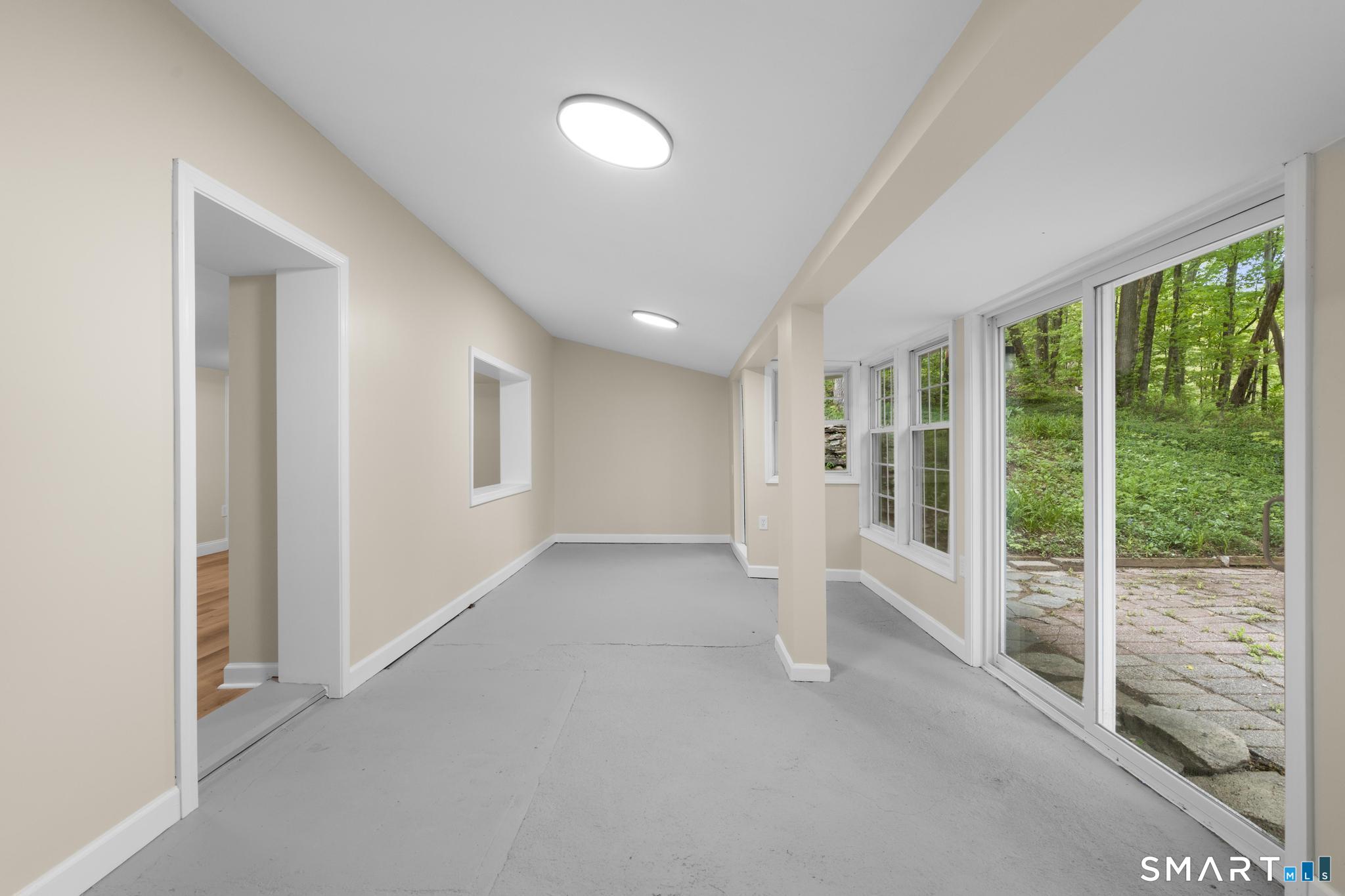 7 Sycamore Terrace Windham, CT 06280 - Photo 34 of 40 a view of an empty room with windows