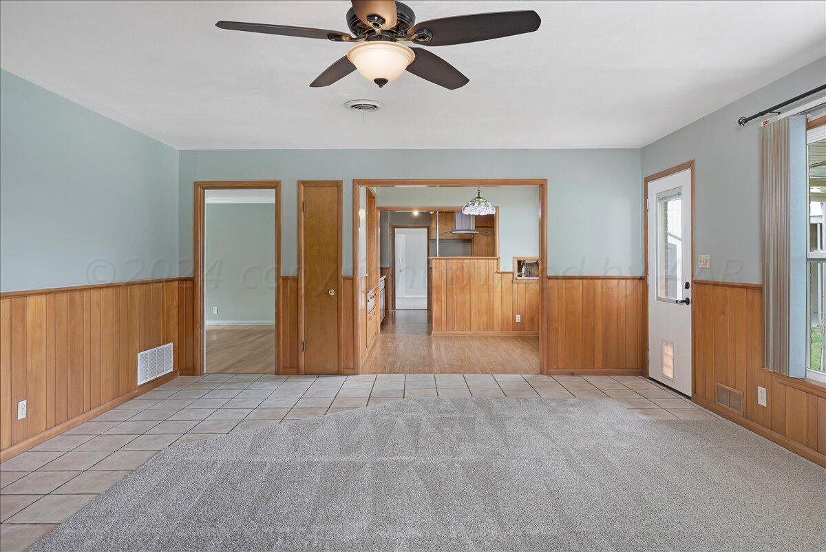 3017 Mockingbird Lane Amarillo, TX 79109 - Photo 8 of 25 an empty room with closet and windows