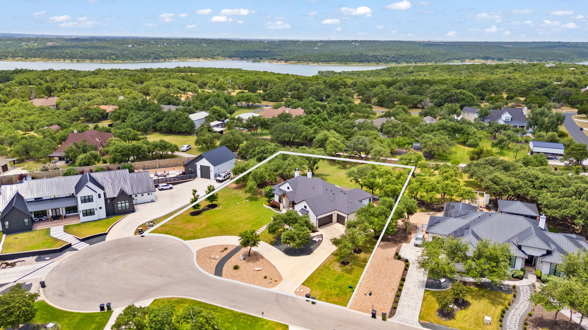 104 Lower Cedar Cove Georgetown, TX 78633 - Photo 3 of 37 an aerial view of residential houses with outdoor space and swimming pool