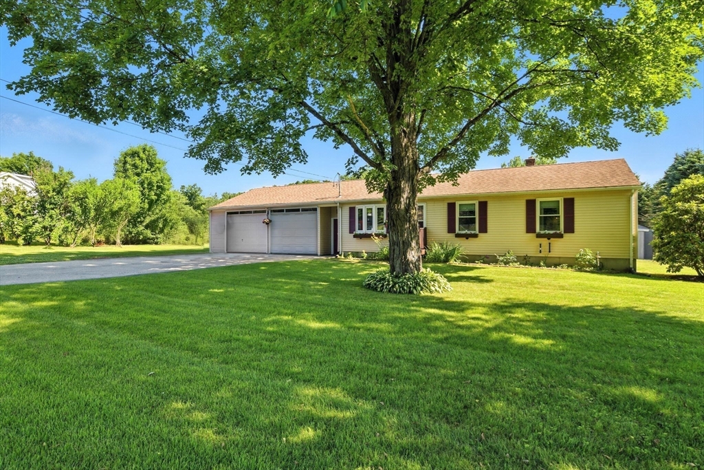 4 Dunhamtown Road Monson, MA 01069 - Photo 1 of 27 a front view of house with yard and green space