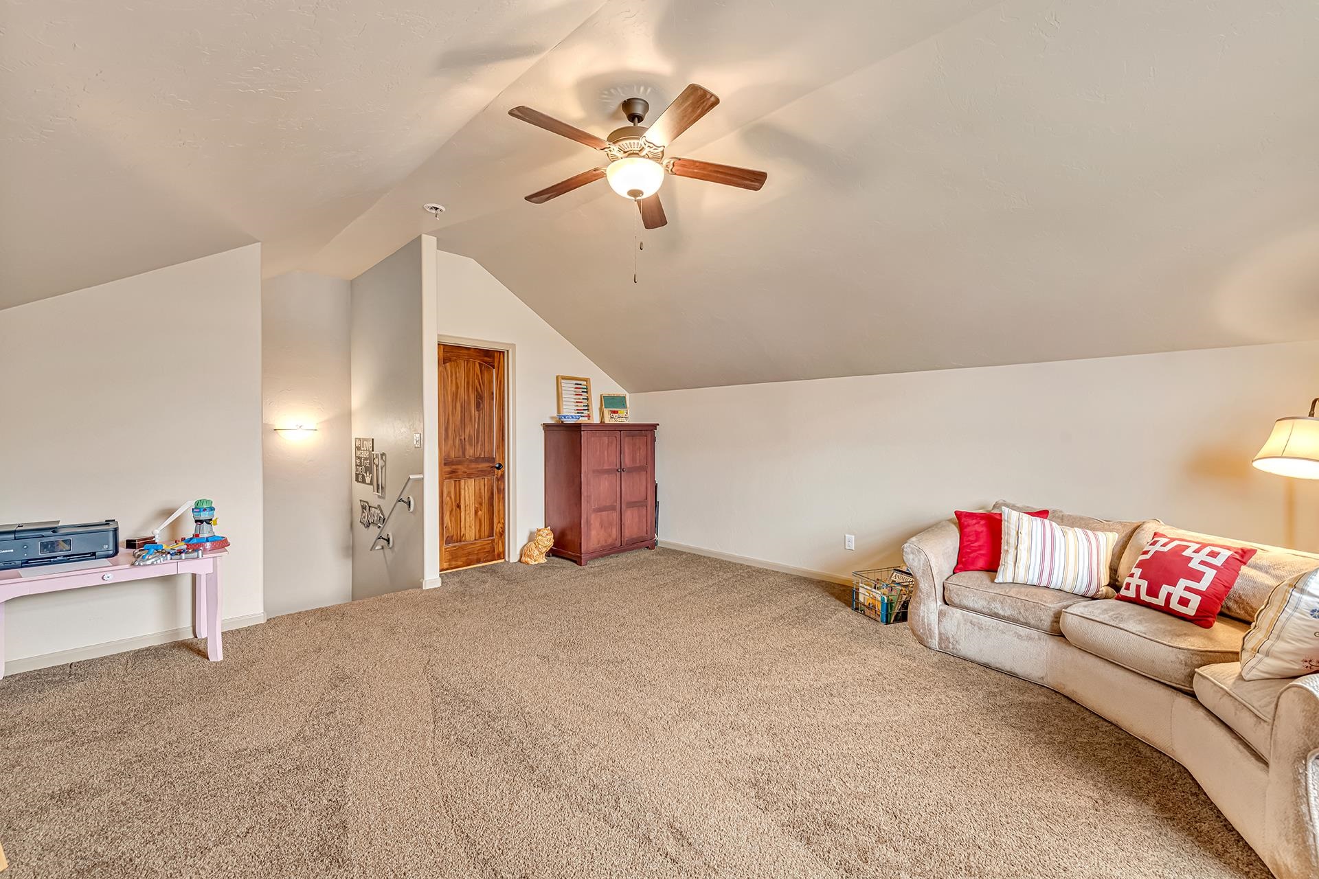 1660 Powis Lane Fruita, CO 81521 - Photo 21 of 38 a living room with furniture and kitchen view