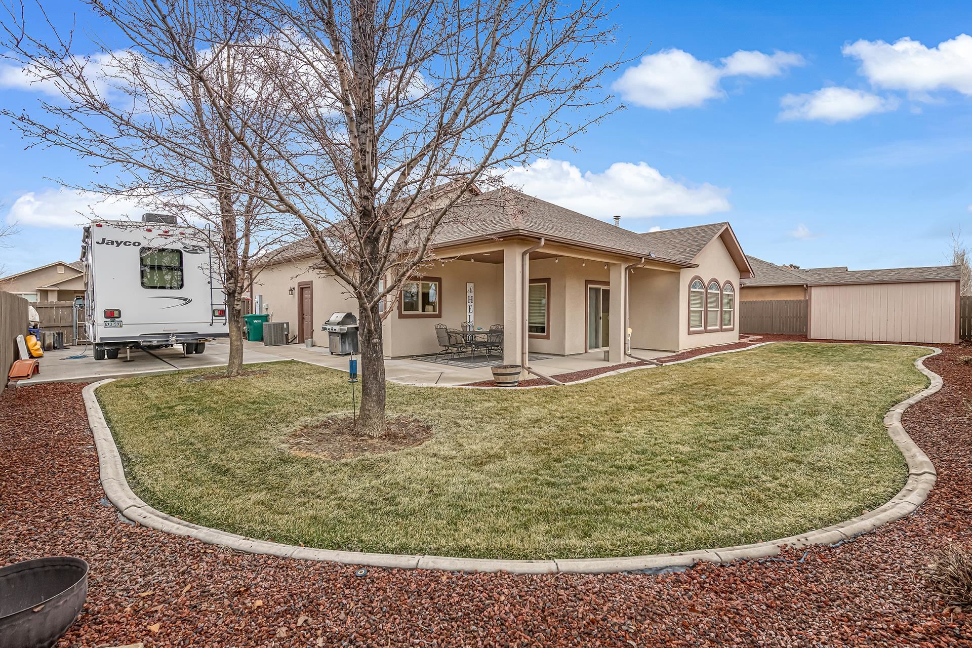 1660 Powis Lane Fruita, CO 81521 - Photo 24 of 38 a view of outdoor space yard and house